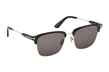 Tom Ford FT1242-K sunglasses in shiny black with brushed gold browline detailing and grey ZEISS lenses, angled front view – available at Lifestyle Optical Sydney.