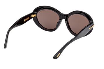 Tom Ford FT1328-F sunglasses in shiny black with gold detailing shown from a rear angle, highlighting wide sculpted temples and dark lenses – available at Lifestyle Optical Sydney.