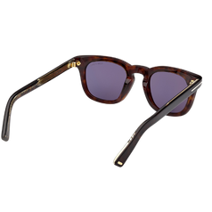 Tom Ford FT1326 (52V) sunglasses in Havana acetate with blue lenses – side and rear angle showing sculpted arms and gold detailing. Available at Lifestyle Optical, Westfield Sydney.